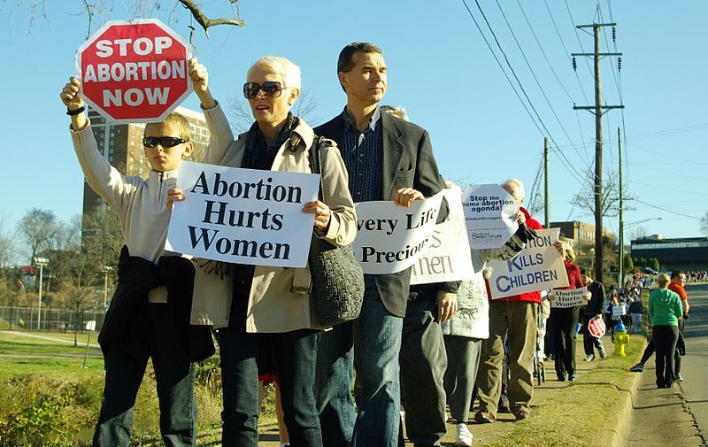 English: Participants in the "March for Life" walk along Concord Avenue in Knoxville, Tennessee, United States. Photo: Brian Stansberry