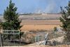 Smoke rises from Gaza near where Hamas militants broke through a fence. (Photo by Alexi J. Rosenfeld/Getty Images)