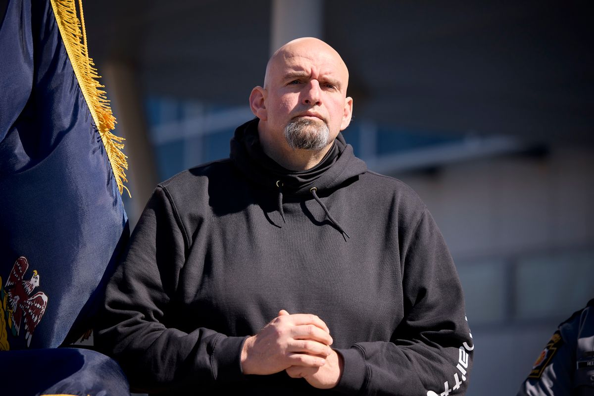 John Fetterman listens as two fallen police officers are honored in March of 2022. Image: Gov. Tom Wolf's office. 