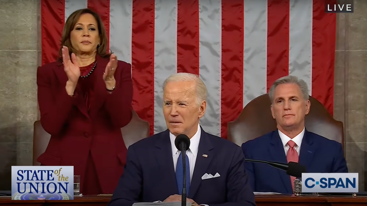 Biden addresses Congress during the State of the Union, flanked by Vice President Kamala Harris (left) and n. Image: C-SPAN