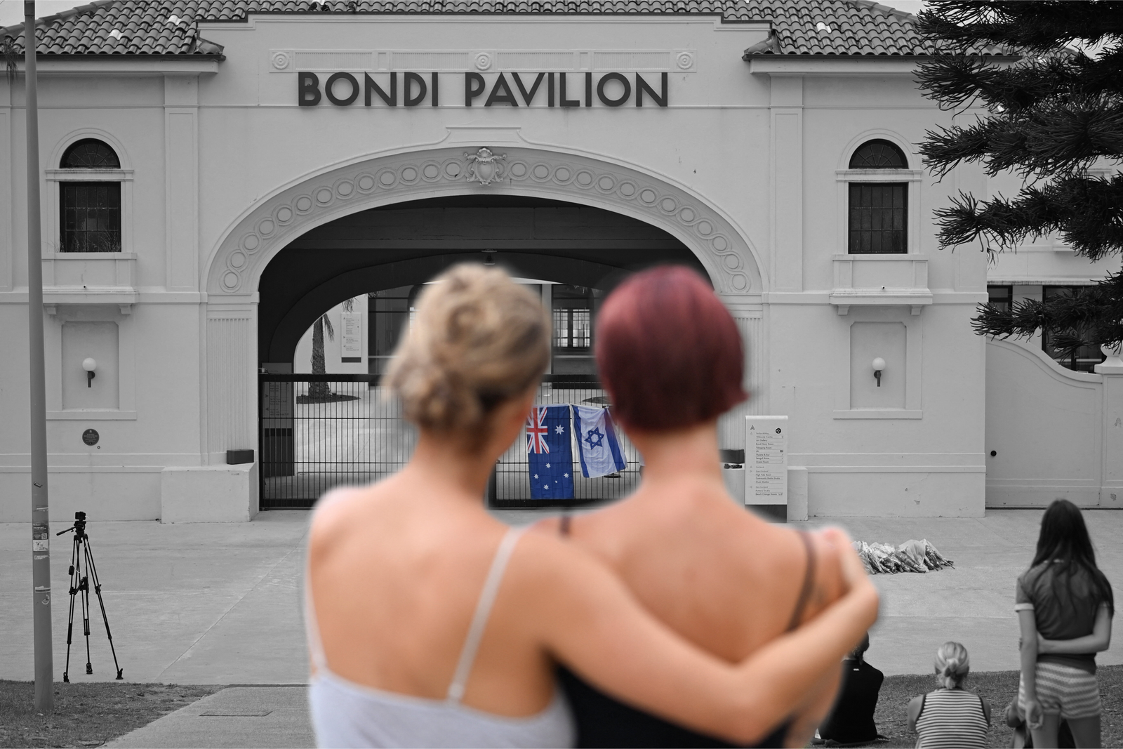 People gather near Bondi Pavilion following a mass shooting at Bondi Beach in Sydney, Australia | REUTERS/Flavio Brancaleone, edited by Russell Nystrom