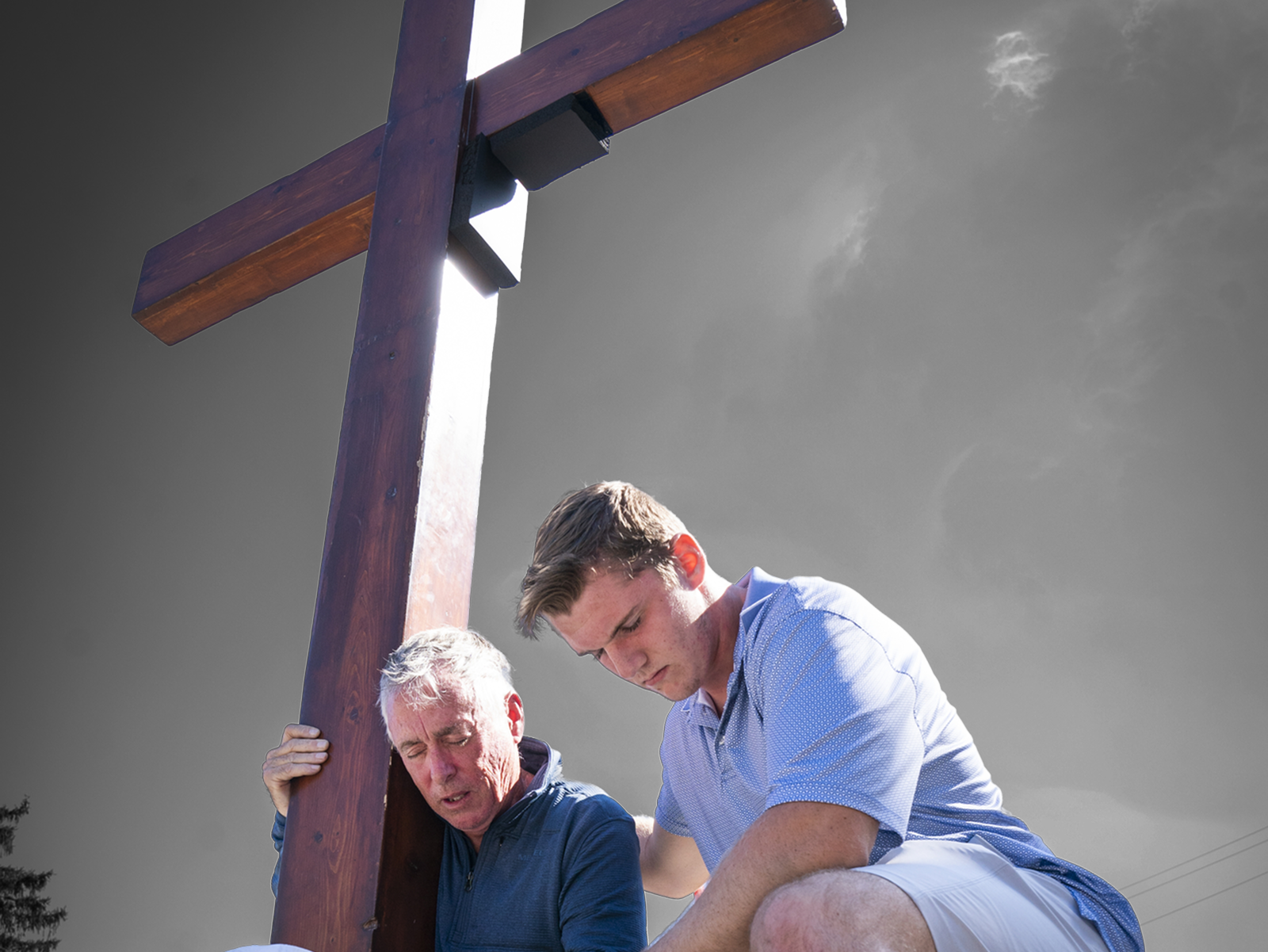 Dan Beazley prays with Benjamin Stanley in Grand Blanc, MI | Mandi Wright/Detroit Free Press via ZUMA Press Wire, edited by Russell Nystrom