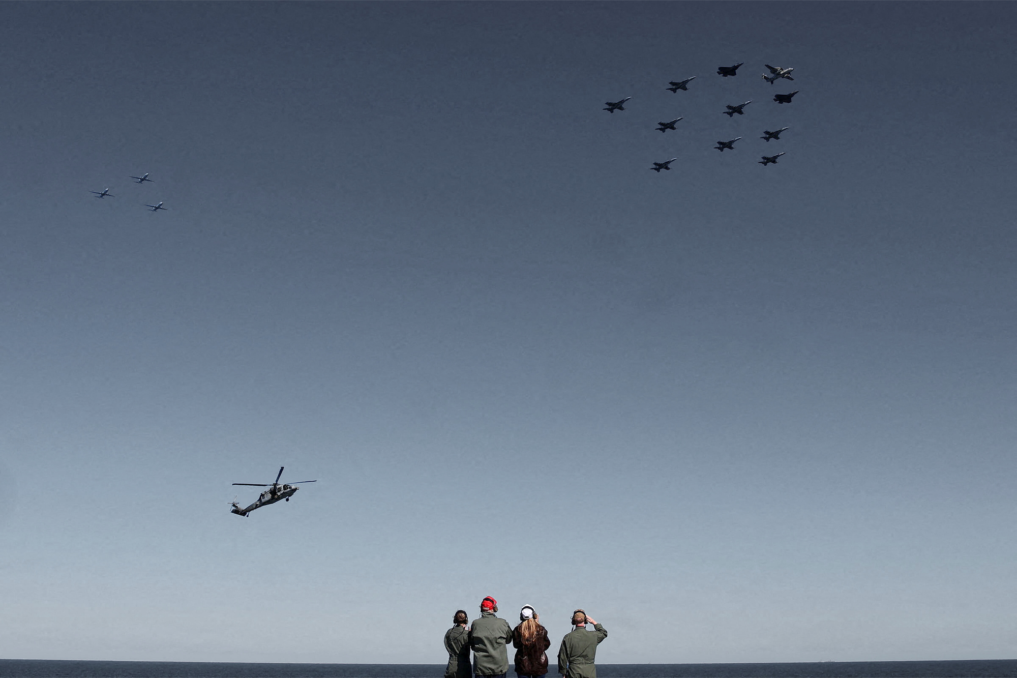 President Donald Trump and First Lady Melania Trump aboard the aircraft carrier USS George H.W. Bush on October 5, 2025 | REUTERS/Jonathan Ernst, edited by Russell Nystrom