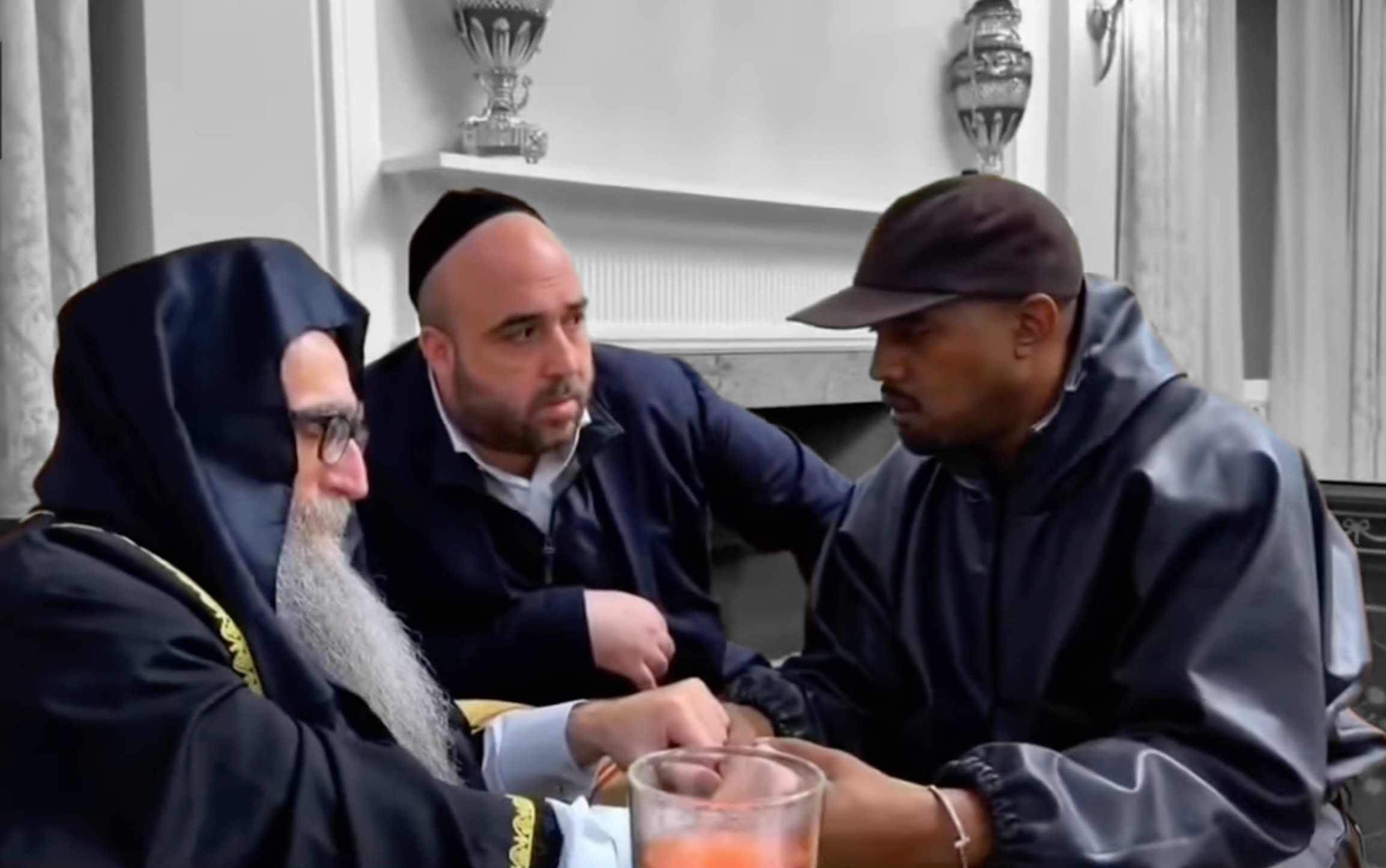 Rabbi Yoshiyahu Yosef Pinto and Kanye West | Screenshot from YouTube/i24NEWS English, edited by Russell Nystrom