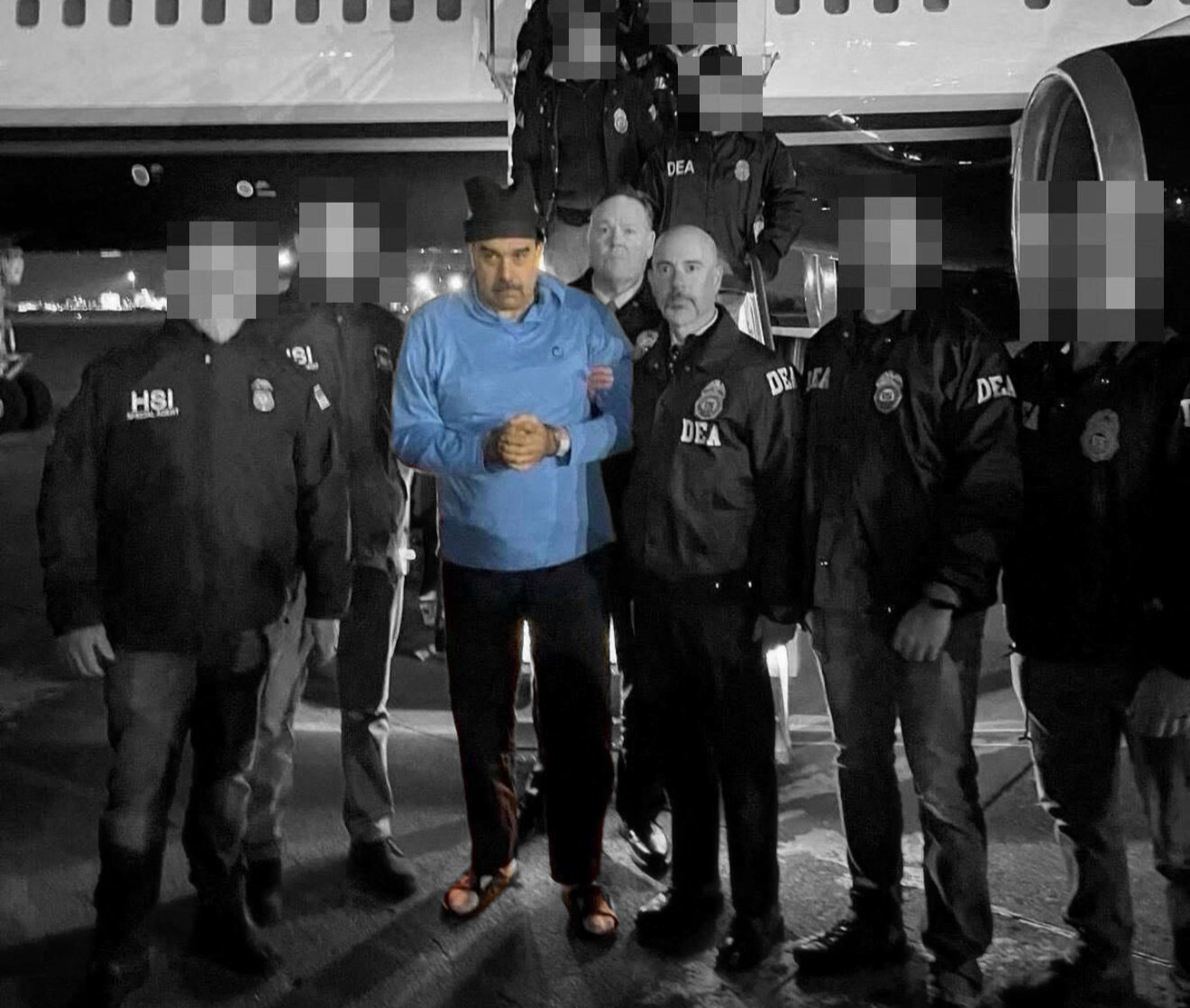 Venezuela's captured President Nicolás Maduro and DEA Administrator Terry Cole in Newburgh, NY | Image via Reuters, edited by Russell Nystrom