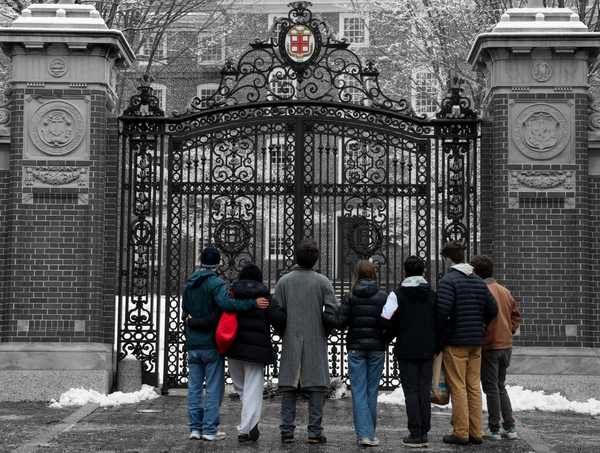 Students stand in front of the Van Wickle Gates at Brown University in Providence, Rhode Island | REUTERS/Kylie Cooper, edited by Russell Nystrom