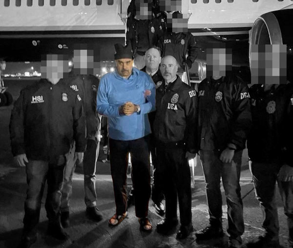 Venezuela's captured President Nicolás Maduro and DEA Administrator Terry Cole in Newburgh, NY | Image via Reuters, edited by Russell Nystrom