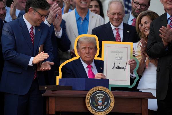 U.S. President Donald Trump presents the "One Big Beautiful Bill Act" after signing it — July 4, 2025 | REUTERS/Leah Millis, edited by Russell Nystrom